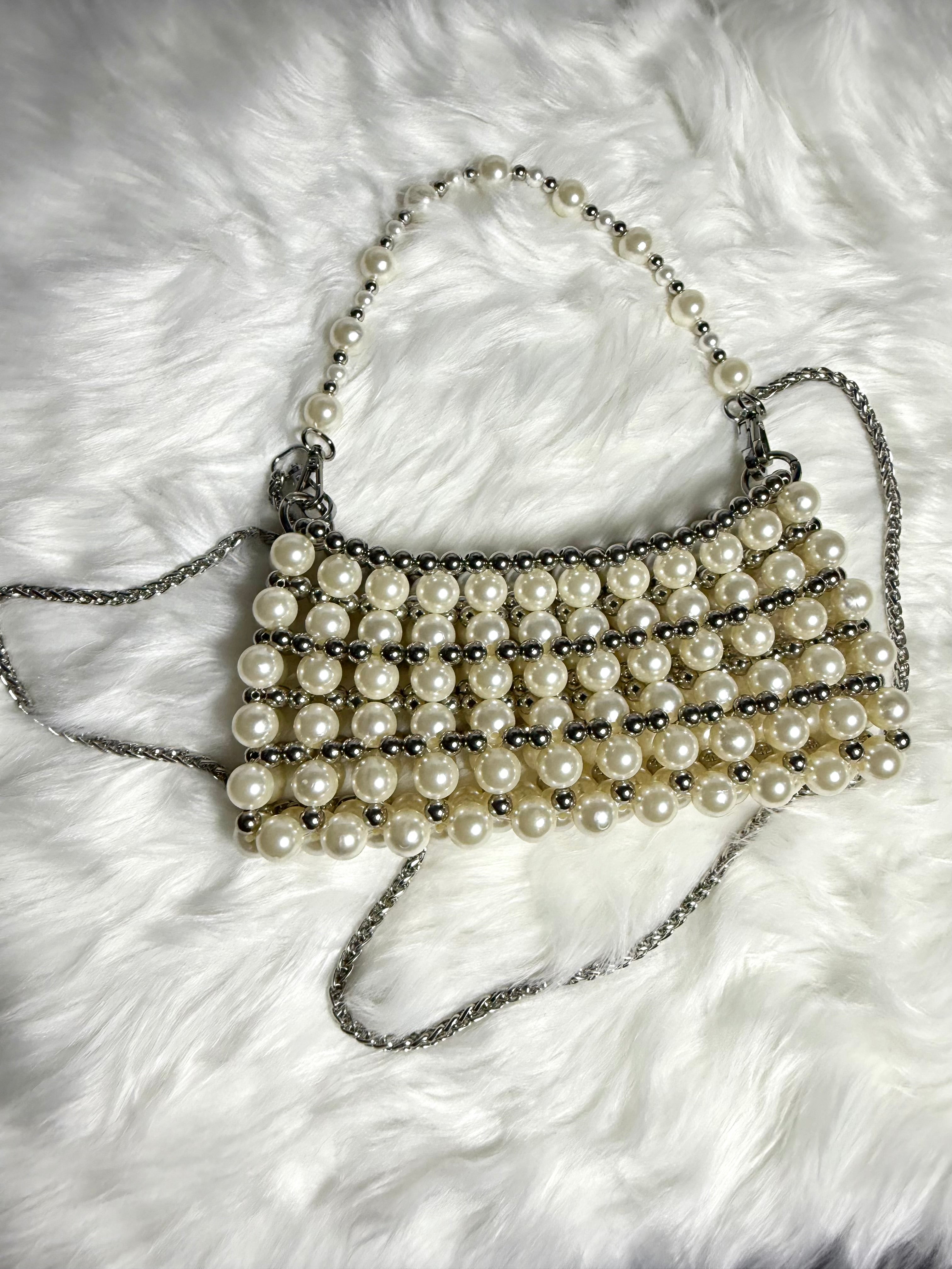 Mimi — Ivory and silver