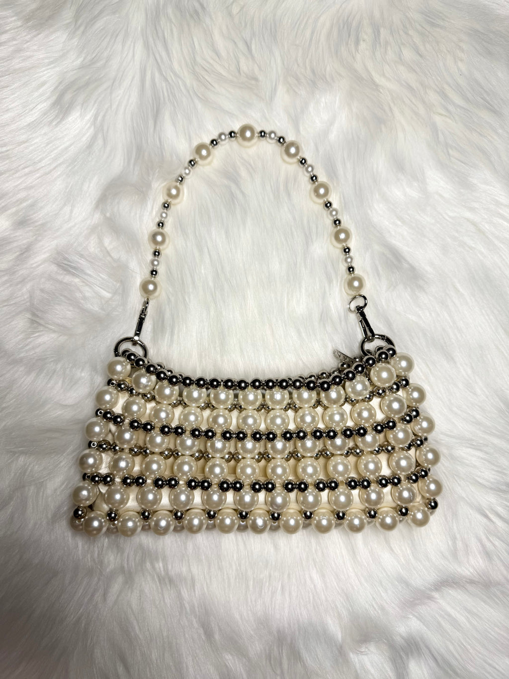 Mimi — Ivory and silver