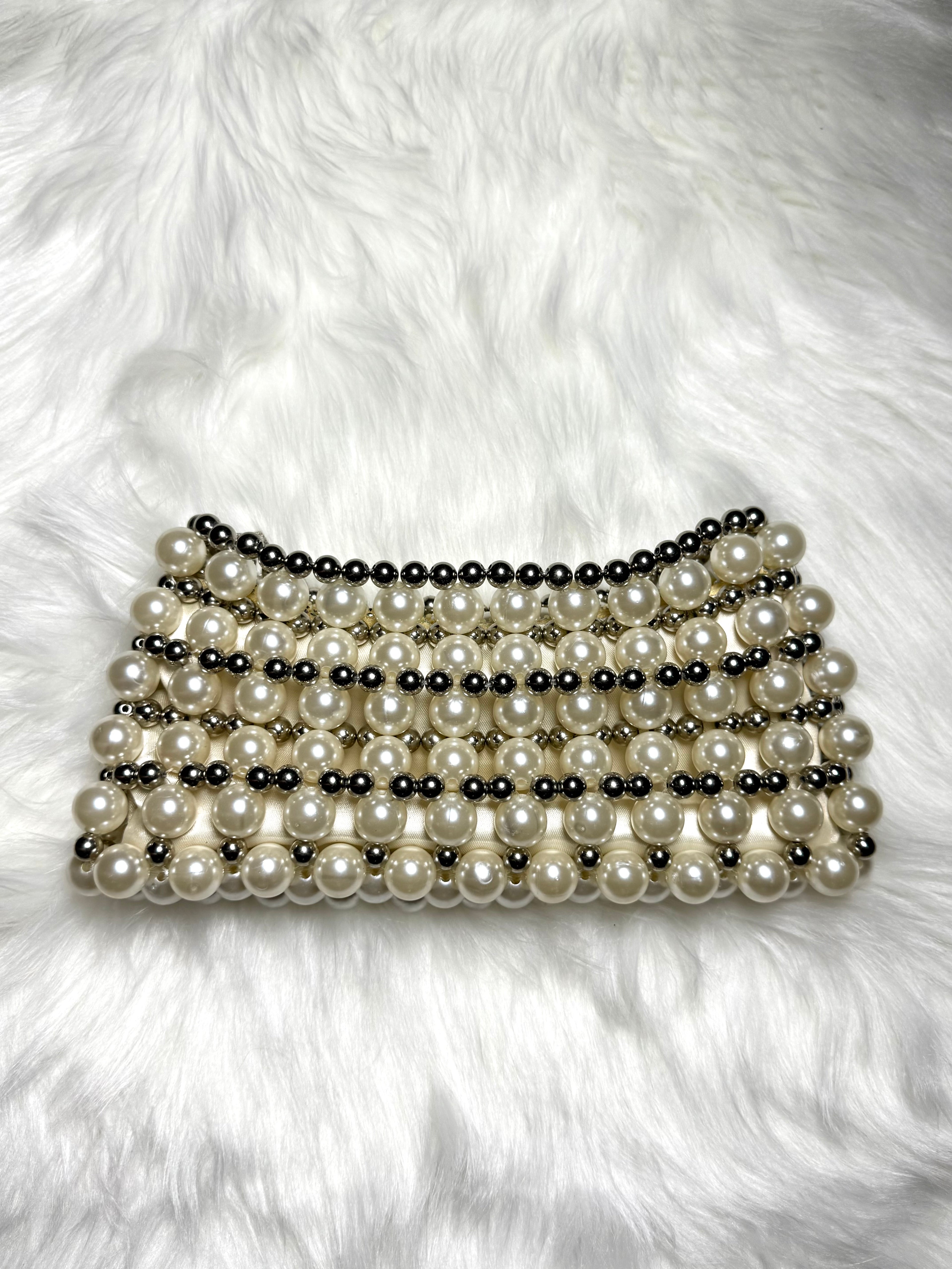 Mimi — Ivory and silver